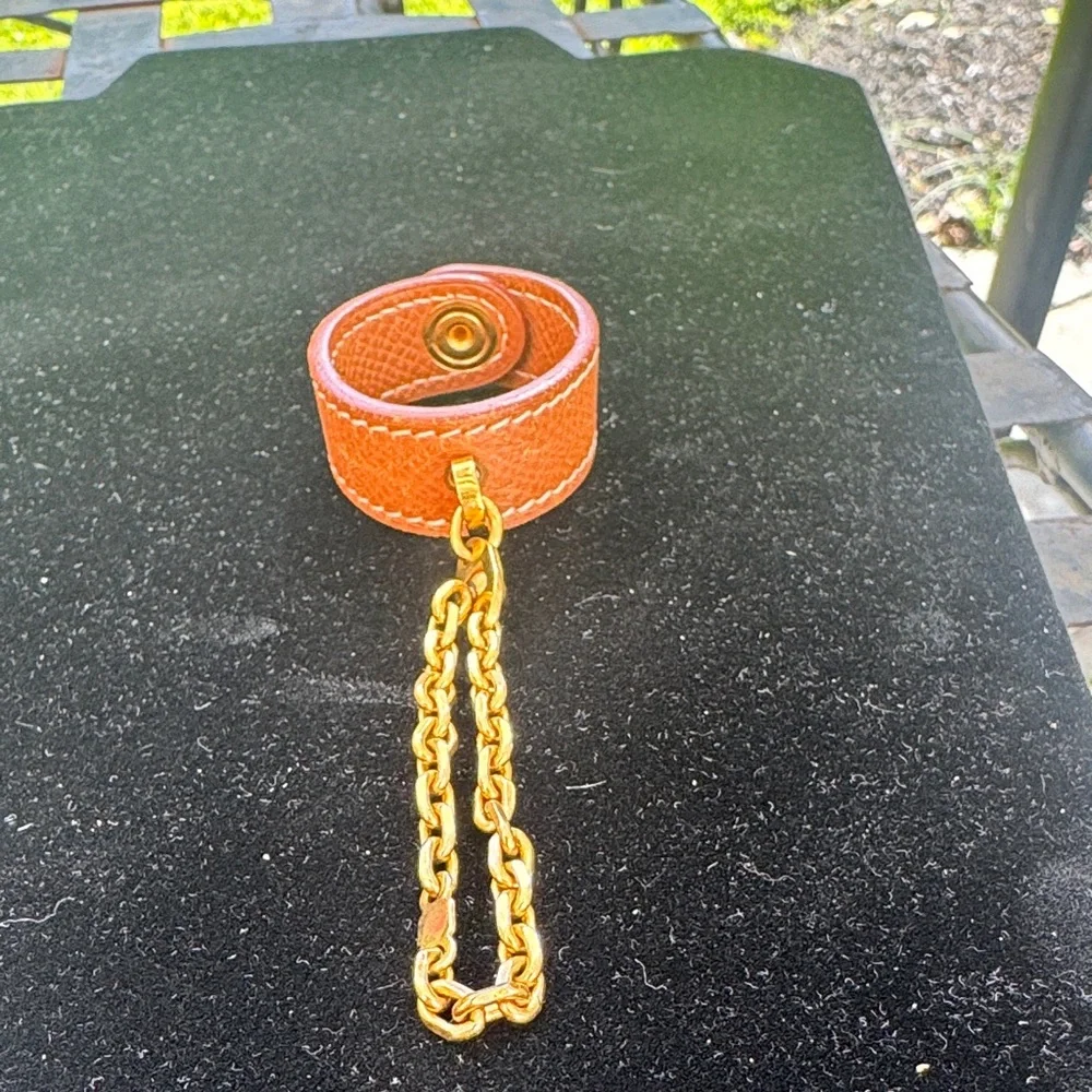 Hermes Nomade tan leather with Gold Chain glove holder